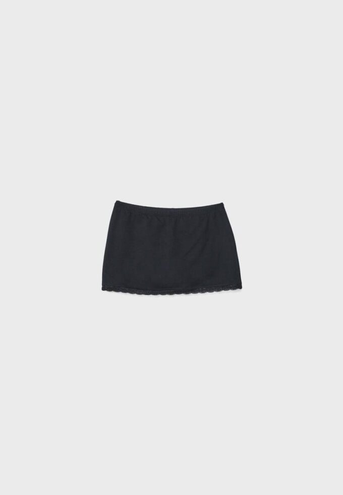 Μίνι Skort με δαντελένια τελειώματα Μίνι Skort με δαντελένια τελειώματα