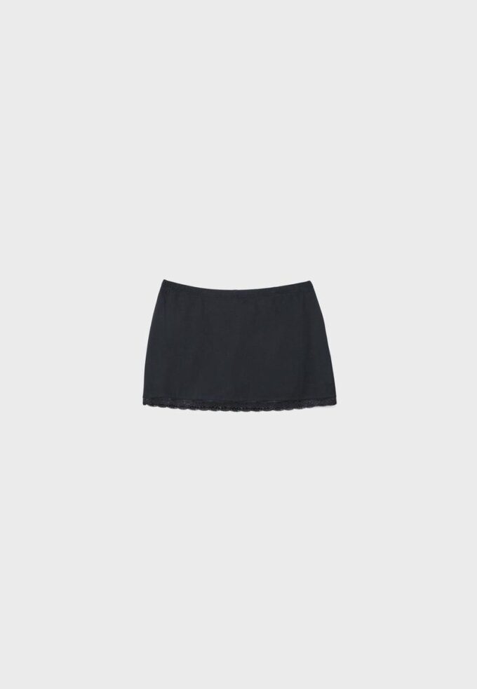 Μίνι Skort με δαντελένια τελειώματα Μίνι Skort με δαντελένια τελειώματα