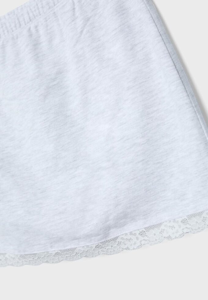 Μίνι Skort με δαντελένια τελειώματα Μίνι Skort με δαντελένια τελειώματα
